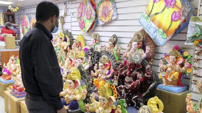 Colourful Ganesh statues made of plaster at the Madhoor store in Bur Dubai. Authorities are advising the Indian community to limit visitors to immediate family members to prevent the spread of the coronavirus. Pawan Singh / The National