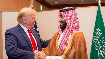 Saudi Arabia's Crown Prince Mohammed bin Salman shakes hands with U.S. President Donald Trump, at the G20 leaders summit in Osaka, Japan, June 29, 2019. Bandar Algaloud/Courtesy of Saudi Royal Court/Handout via REUTERS ATTENTION EDITORS - THIS PICTURE WAS PROVIDED BY A THIRD PARTY.