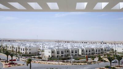 The Alghadeer community, above, which has drawn residents from Abu Dhabi city and Dubai thanks to the relatively affordable cost of living there. Silvia Razgova / The National