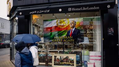 Some shops owned by Iranians in London have put up displays of support for Reza Pahlavi, the exiled son of Iran's last shah. Getty