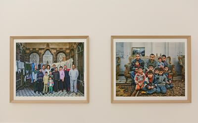 Robert Polidori’s images of a Syrian Christian family, left, and a Muslim family, right, were taken in 1994. Photo by Ahmed Al Thani