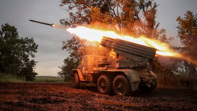 Ukrainian troops fire a BM-21 Grad multiple rocket launcher near the front line in Donetsk region. Reuters