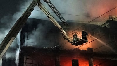 Dozens of people have been rescued from the commercial building. AP