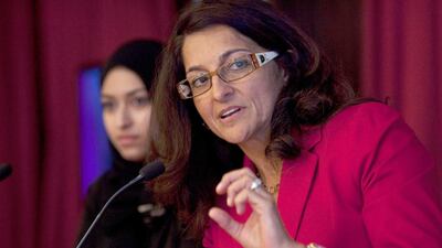 Dr Houriya Kazim speaks, with female Emirati weightlifter Amna Al Haddad, at the 85 Broads Global Forum last year. Christopher Pike / The National