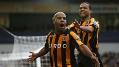 Hull's Marlon King celebrates scoring the third goal in the Tigers' 3-0 win against West Brom.