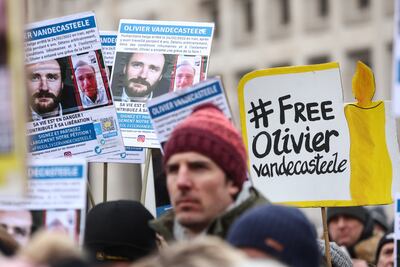 People gather in Brussels on Sunday to protest against the detention of Belgian aid worker Olivier Vandecasteele in Iran. EPA