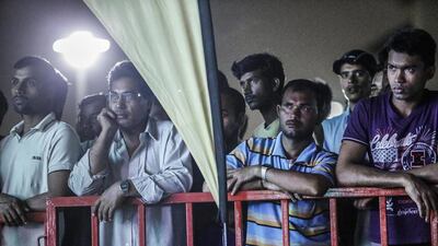 Supporters and audience members enjoy the first two rounds.