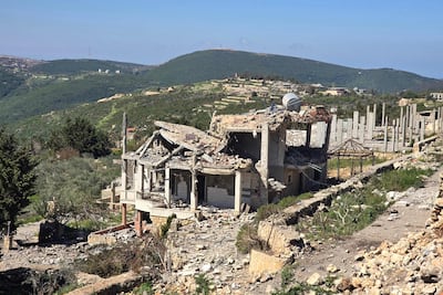 Rubble and debris along the road at the site of a home destroyed by the Israeli army in the southern Lebanese village of Beit Lif, in the Bint Jbeil district. AFP