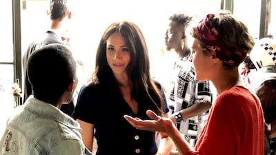 The Duchess of Sussex met with artisans, musicians, and community members. Reuters