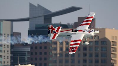 The UK's Paul Bonhomme of team Bonhomme finished first in the Master class at the Red bull Air Race World Championship 2015 yesterday on the breakwater in Abu Dhabi. Ravindranath K / The National