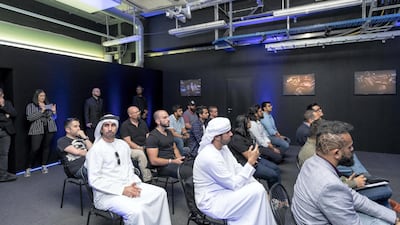 Drivers attend a briefing before heading onto the circuit. Courtesy Abu Dhabi Motors