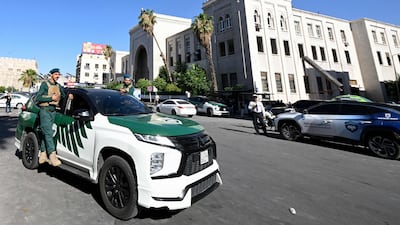Syrian security forces secure the area around the Palace of Justice. AFP