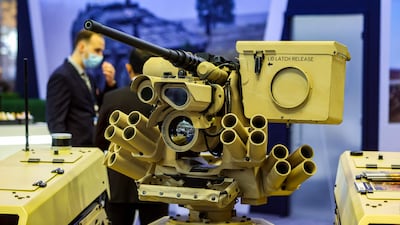 Milrem Robotics' Estonia-built tracked hybrid modular infantry system unmanned ground vehicle, known as THeMIS, at the Doha International Maritime Defence Exhibition in the Qatari capital.