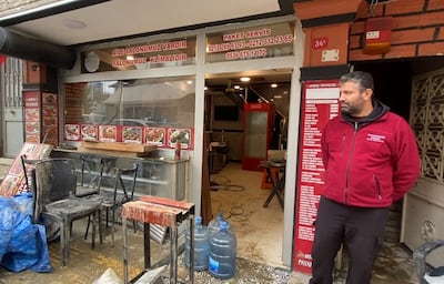 Kebab shop owner Omer Payamzade has not been able to pay his employees since last week's floods (Lizzie Porter/ The National)