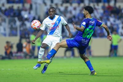 Al Hilal's Saud Abdulhamid, left, has been called-up to the Saudi Arabia squad by Roberto Mancini. Getty Images