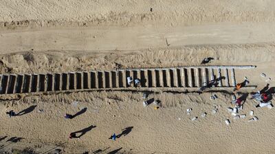 In Deir Al Balah, central Gaza Strip, graves are prepared for the unidentified remains of Palestinians who died in Israeli detention during the Gaza conflict. Reuters