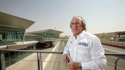 Sir Jackie Stewart shows off his unique sartorial elegance at Dubai Autodrome before reflecting on the dangerous days of F1 racing.