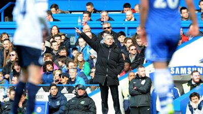Chelsea manager Jose Mourinho gestures during the English Premier League football match between Chelsea and Everton at Stamford Bridge in London on February 22, 2014. Chelsea won 1-0. AFP PHOTO / OLLY GREENWOOD