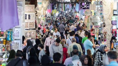 Iranians at the Grand Bazaar in the capital Tehran on June 13, 2022. AFP