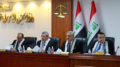 Iraqi judges at the Supreme Judicial Council in Baghdad on December 27. AFP