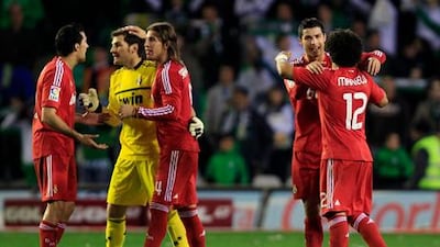 Real Madrid's players celebrate their 3-2 win over Real Betis.