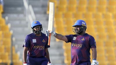 Mohammad Shahzad of Deccan Gladiators scored a fifty against Qalandars in the Abu Dhabi T10 on Tuesday. Pawan Singh / The National