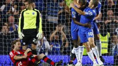 Chelsea's Salomon Kalou, centre, celebrates with Joe Cole, second right, and Fabio Borini, right, after scoring against Queens Park Rangers during their English League Cup soccer match at Stamford Bridge in London on September 23, 2009.