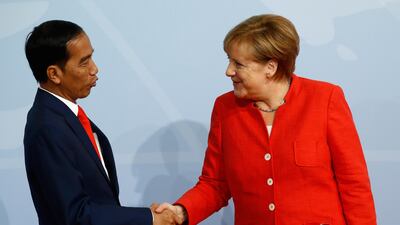 German Chancellor Angela Merkel welcomes Indonesia's president Joko Widodo. Odd Andersen / AFP Photo