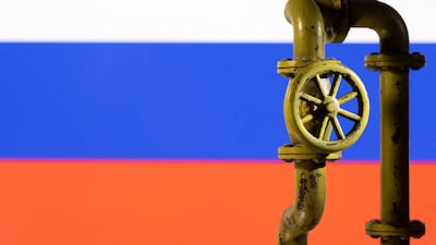 A 3D printed natural gas pipeline is placed in front of displayed Russian flag in this illustration taken last month. Reuters