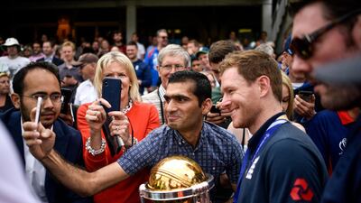 A fan takes a selfie with Eoin Morgan, Captain, during the England ICC World Cup Victory Celebration at The Kia Oval in London, England. Getty Images