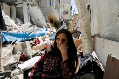 Palestinian Intisar Muhana, 97, who was forced to flee her village in 1948 and whose house was destroyed by an Israeli strike in recent fighting in Gaza City. Reuters