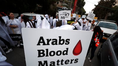 Israeli-Arabs protest against rising crime in Haifa, where police say more than 160 Arabs have been killed so far this year. EPA