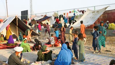 Families who arrived from Afghanistan are seen at their makeshift tents as they take refuge near a railway station in Chaman, Pakistan. Reuters