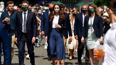 Catherine, Duchess of Cambridge walks at the All England Lawn Tennis and Croquet Club as she attends the Wimbledon Championships in Wimbledon, Britain.