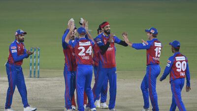 Karachi Kings players celebrate the dismissal of Multan Sultans' Shan Masood. AFP