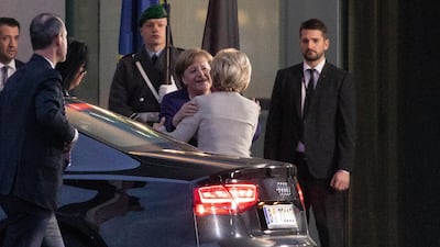 German Chancellor Angela Merkel greets EU Commission President Ursula Von der Leyen upon her arrival at the Federal Chancellery in Berlin. EPA