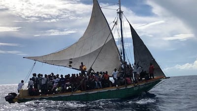 More than 100 migrants aboard a 35-foot sailing vessel was interdicted by a Coast Guard Station Miami law enforcement crew near Biscayne Bay, Florida, US, September 16, 2021. US Coast Guard/Handout via REUTERS