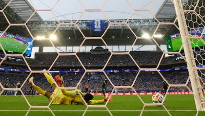 Saudi Arabia's Mohammed Al-Owais makes a save against Uruguay. Reuters