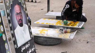 Workers build and design gravestones at the cemetery