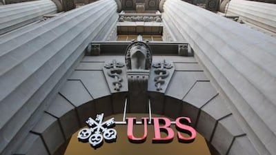 UBS AG, Switzerland's biggest bank, said it may post a loss in the third quarter because of a $2 billion loss from unauthorized trading at its investment bank. AFP PHOTO / Sebastian Derungs