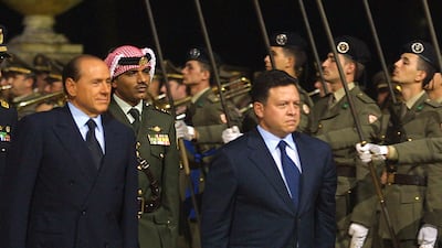 Mr Berlusconi welcomes Jordan's King Abdullah in Rome in October 2001. AFP