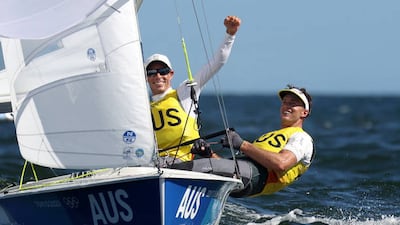 Mathew Belcher and Will Ryan of Team Australia celebrate winning gold in the Men's 470 class.