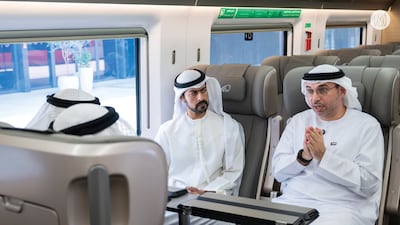 Sheikh Khalifa bin Tahnoon, Chairman of the Abu Dhabi Crown Prince's Court, with senior officials onboard one of the Etihad Rail trains