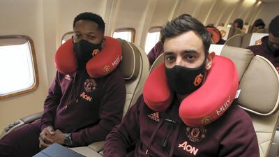 Fred and Bruno Fernandes on the plane for Manchester United's flight to Turin. Getty