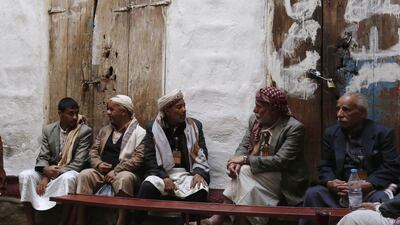 Residents sit at a popular cafe in the old quarter of Sana'a, Yemen. EPA