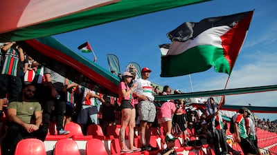 Palestino fans cheer for their team at the La Cisterna Stadium in Santiago. AFP