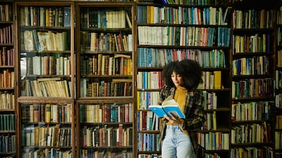 Reading releases dopamine steadily, helping to retrain your brain’s reward system by focusing on sustained gratification over time. Getty Images