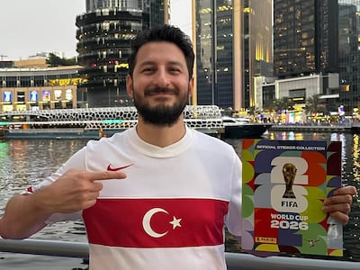 Turkish football fan Sertac Akpinar with his World 2026 sticker album. Photo: Sertac Akpinar