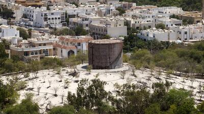 Once a major landmark, the water tank in the Khalidiya area of the capital now stands neglected and decaying. Christopher Pike / The National