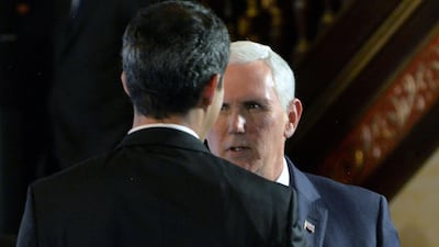 US Vice President Mike Pence (R) and Venezuelan opposition leader and self-declared acting president Juan Guaido (backwards), take part in a meeting with Foreign Ministers of the Lima Group at Colombia's Foreign Affairs Ministry in Bogota. AFP